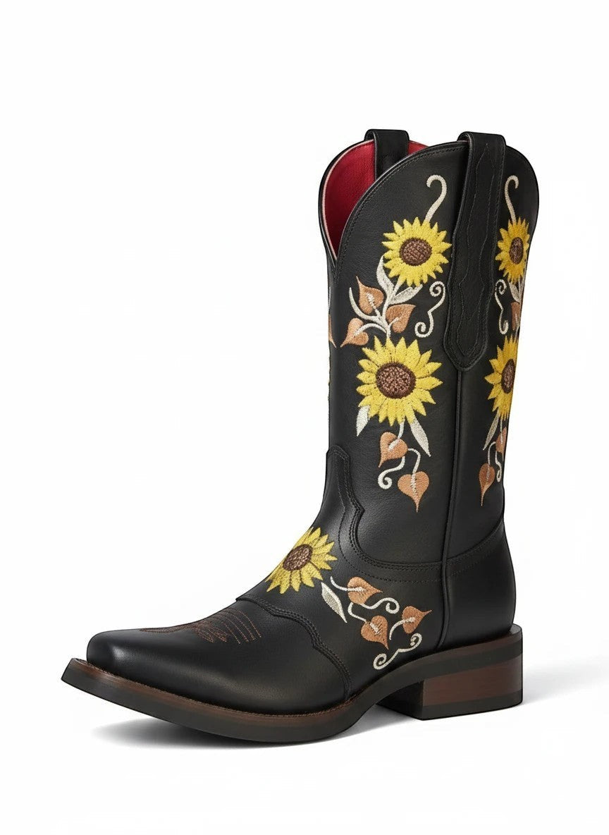 Bota vaquera RAVAC para mujer en piel negra con bordado artesanal de girasoles amarillos y estilo western